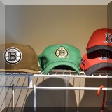 H03. Bruins and Red Sox hats. 